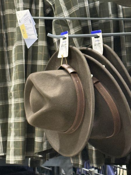 found these in the men's section and now i can't stop thinking about it. i already own one felt hat and wear it maybe twice a year… but this one has the little leather band. talk me into it or out of it