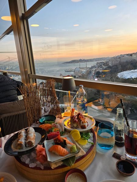 finally tried the sushi spot with the skyline view and it did NOT disappoint 🍣 the sashimi platter was unreal and that sunset?? straight up cinematic. treat-yourself dinner done right 🧡 tell me your go-to sushi order, i'm always hunting for new faves